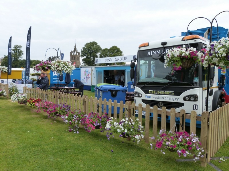 Binn Group stand at Perth Show showing branded trucks