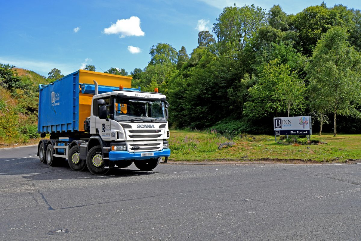 A skip container vehicle leaving the Binn Ecopark